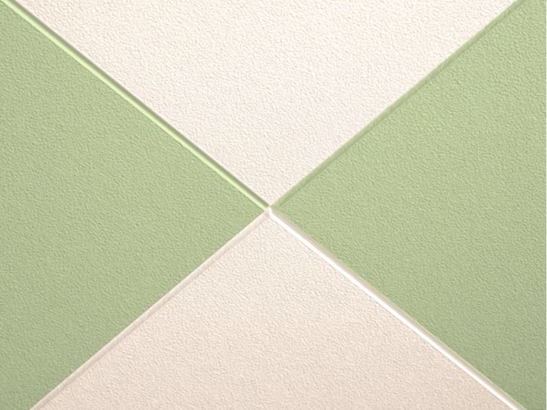  Zbliżenie paneli akustycznych Ecophon Focus Ds w kolorze białym i zielonym.