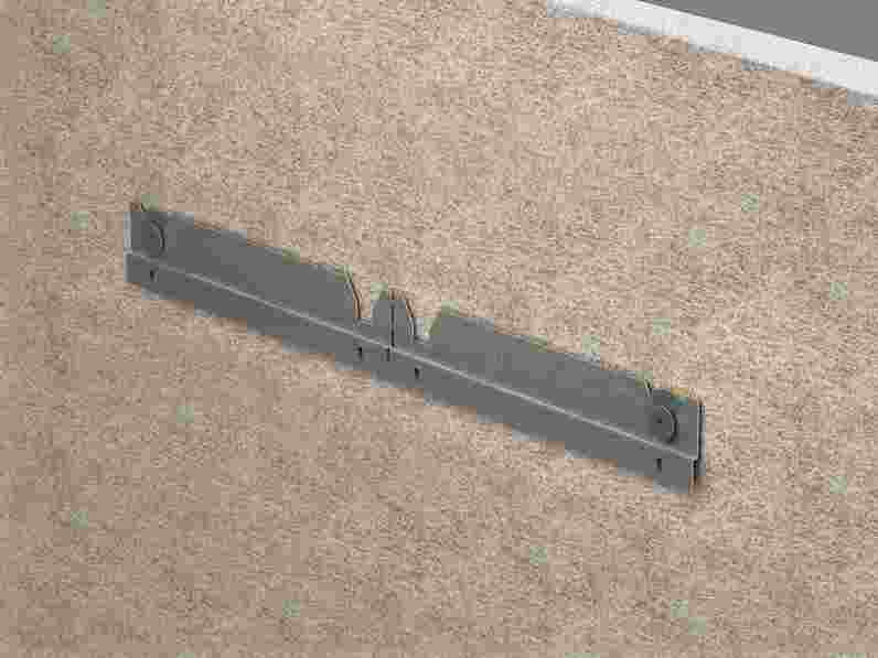 Närbild av väggmonterad installation av väggabsorbent