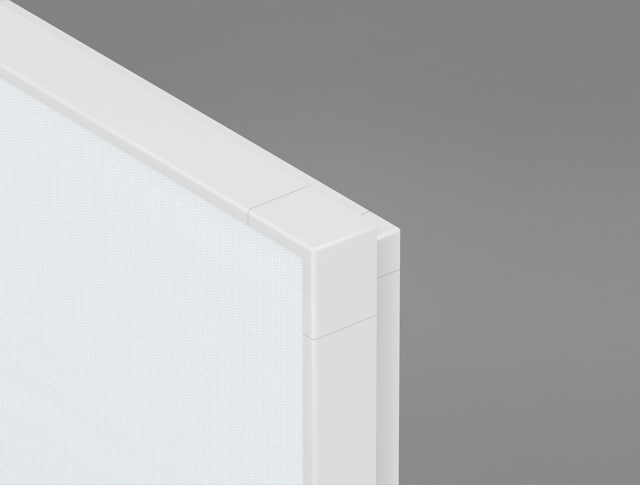 Primo piano dell’angolo superiore di un pannello o divisorio moderno, rettangolare e bianco, su uno sfondo grigio uniforme. Il pannello presenta un design minimalista, con linee pulite e una superficie texturizzata.