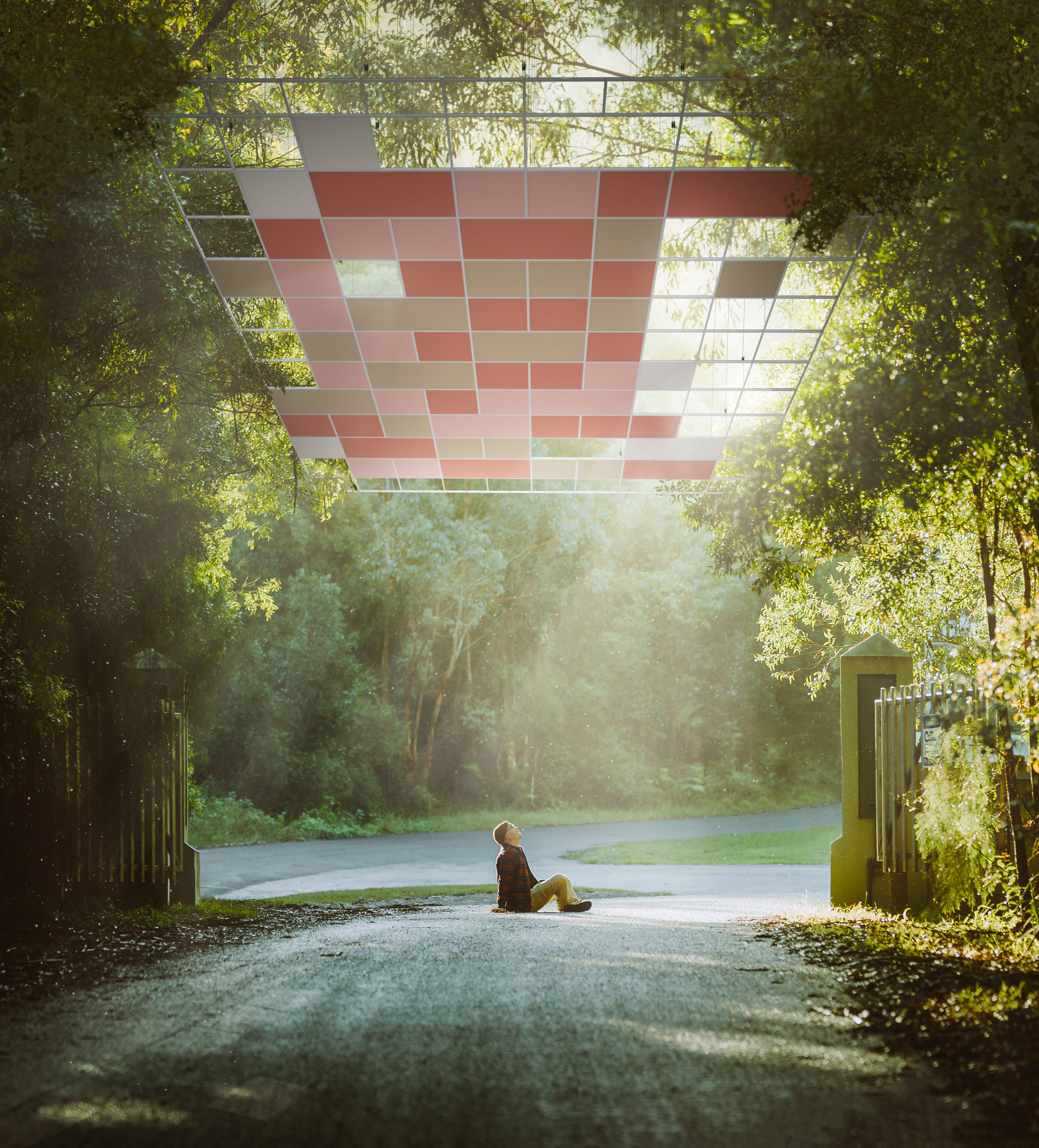 Man sitting on the ground and acoustic ceiling in the sky stairing up at 