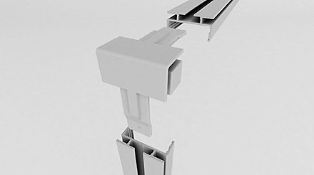 Un rendering 3D di tre componenti rettangolari grigi allineati verticalmente, che sembrano parti di un sistema modulare o di connessione, su uno sfondo bianco uniforme.