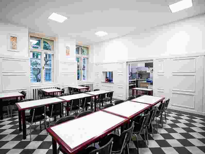 Suspended acoustic ceiling in school canteen