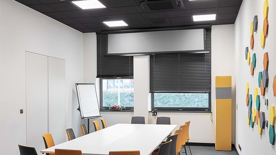 Black acoustic ceiling in conference room