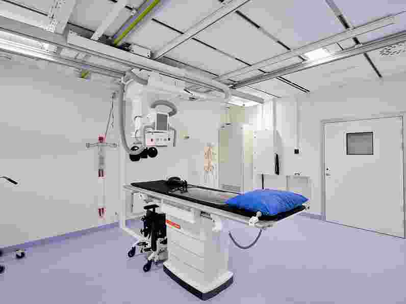 White, suspended acoustic ceiling in radiology facility