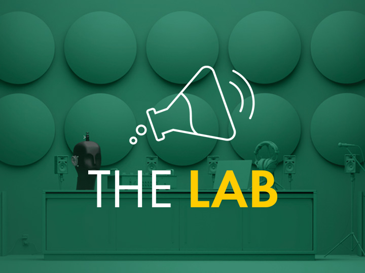A graphic with a green background featuring circular shapes. An outline of a laboratory flask emitting sound waves is next to the text THE LAB, with THE in white and LAB in yellow.