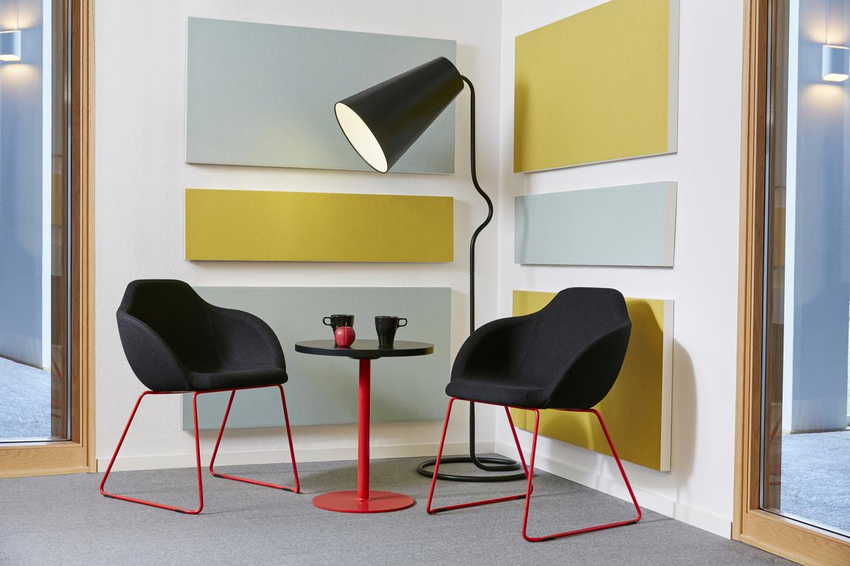 Acoustic wall panels Ecophon Akusto™ One in small room with chairs and table