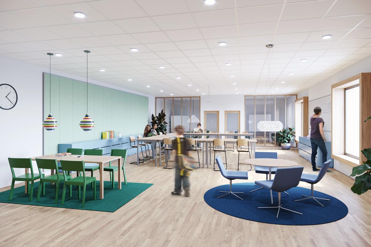 Open learning environment with large acoustic wall panels--Ecophon Akusto™ Wall C-- mounted on the back wall