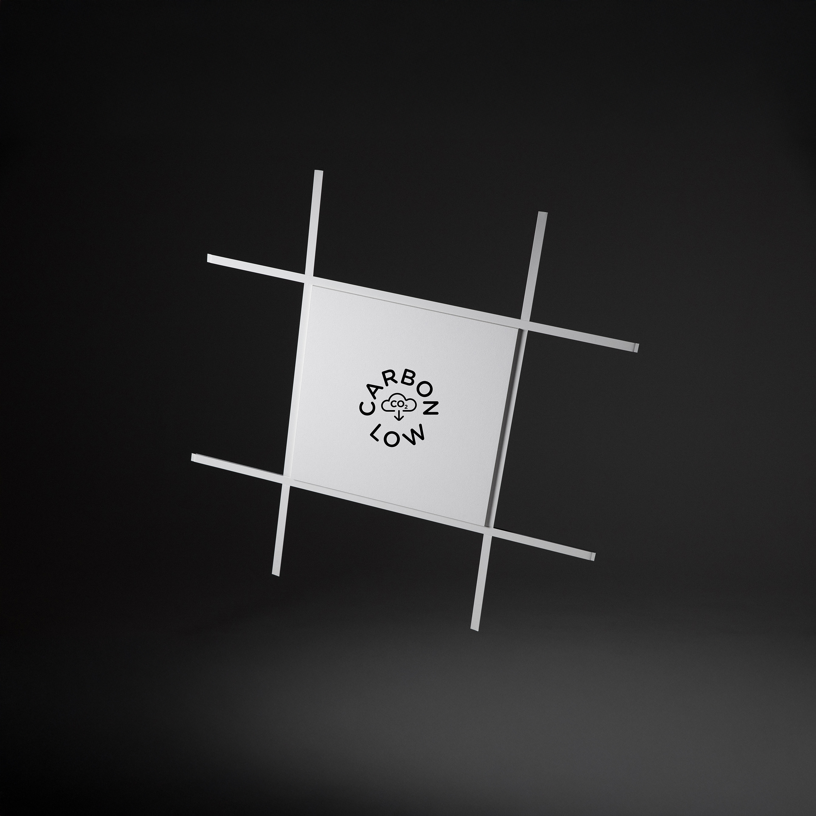 A white acoustic panel in a grid system on a black background. A logotype saying "Carbon low" is visible on the panel.